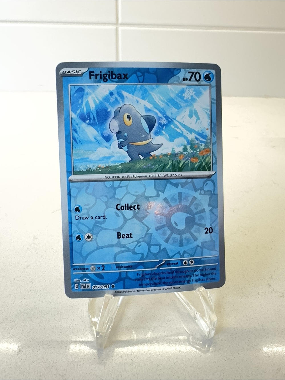Pokemon TCG Card -  Frigibax [Reverse Holo] #17 Pokemon Paldean Fates  Frigibax
